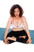 Yoga woman sitting on floor.