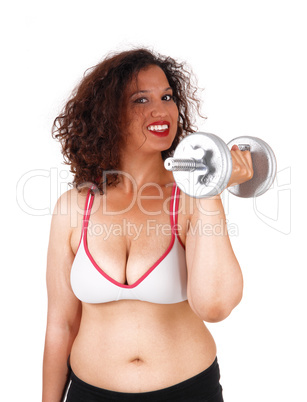 Busty woman with dumbbells.