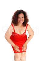 Beautiful woman in red dress bending.