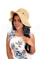 Portrait of woman with straw hat.