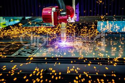 CNC Laser plasma cutting of metal, modern industrial technology.