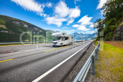 Caravan car travels on the highway.