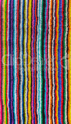 colorful striped beach towel.
