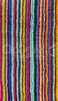 colorful striped beach towel.