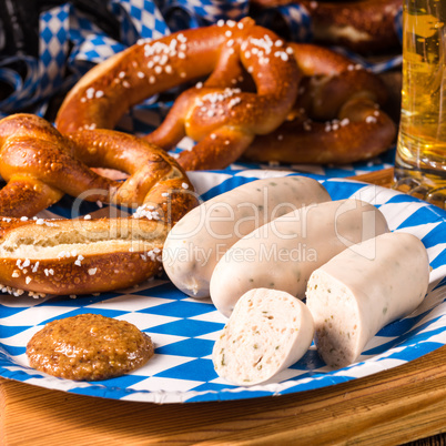 Bavarian sausage with pretzel, sweet mustard