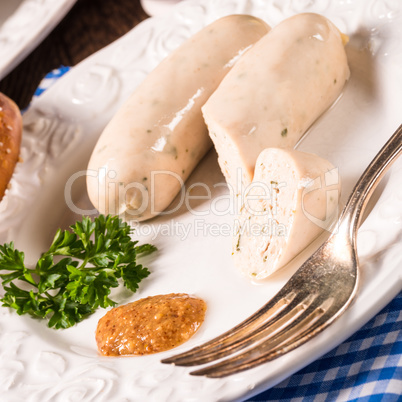 sausage with pretzel, sweet mustard and beer