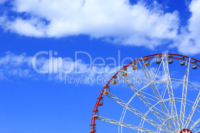 ferris wheel on the blue sky background