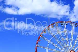 ferris wheel on the blue sky background