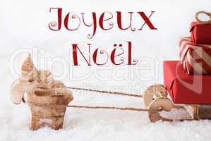 Reindeer With Sled On Snow, Joyeux Noel Means Merry Christmas