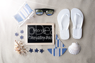 Sunny Blackboard On Sand With Text Merry Christmas