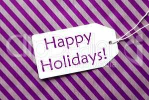 Label On Purple Wrapping Paper, Text Happy Holidays