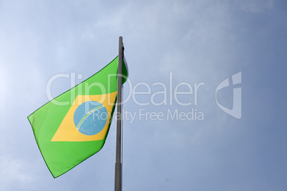 National flag of Brazil on a flagpole