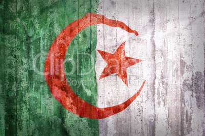 Grunge style of Algeria flag on a brick wall