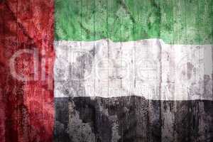 Grunge style of United Arab Emirates flag on a brick wall