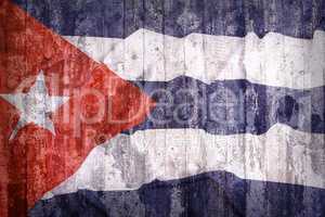 Grunge style of Cuba flag on a brick wall