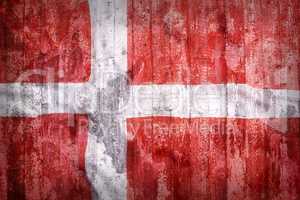 Grunge style of Denmark flag on a brick wall