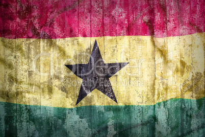 Grunge style of Ghana flag on a brick wall