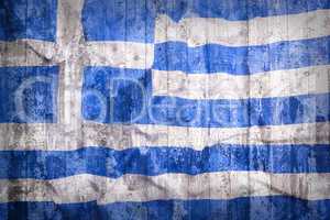 Grunge style of Greece flag on a brick wall