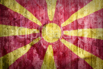 Grunge style of Macedonia flag on a brick wall