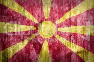 Grunge style of Macedonia flag on a brick wall