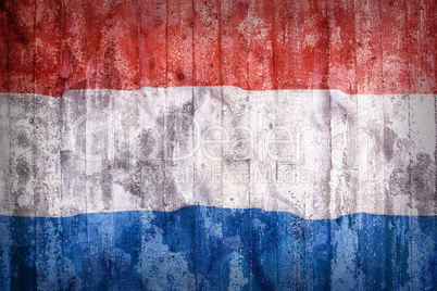 Grunge style of Netherlands flag on a brick wall