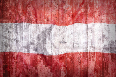 Grunge style of Austria flag on a brick wall