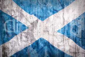 Grunge style of Scotland flag on a brick wall