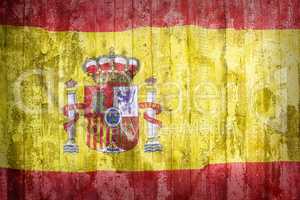 Grunge style of Spain flag on a brick wall