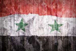 Grunge style of Syria flag on a brick wall