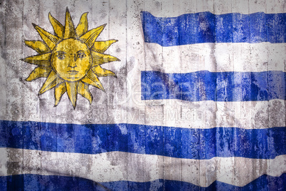 Grunge style of Uruguay flag on a brick wall