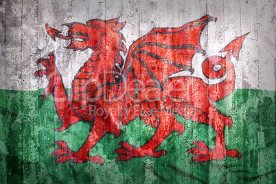 Grunge style of Wales flag on a brick wall