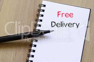 Free delivery text concept on notebook