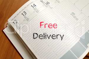 Free delivery text concept on notebook