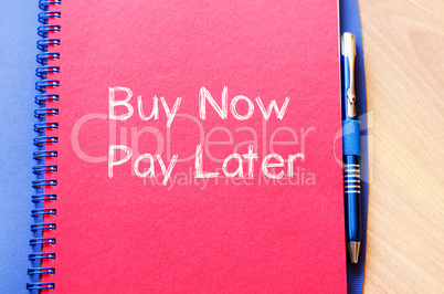 Buy now pay later text concept on notebook
