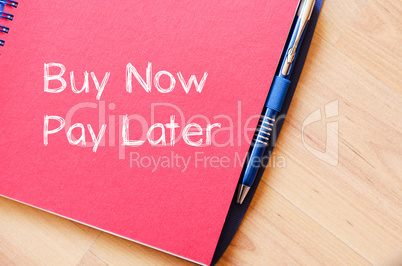 Buy now pay later text concept on notebook