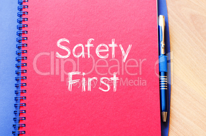 Safety first text concept on notebook