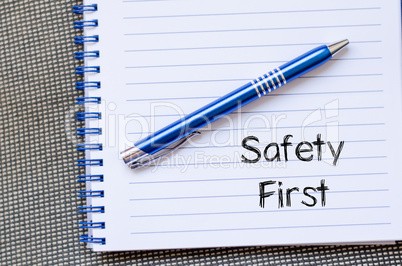 Safety first text concept on notebook