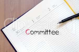 Committee text concept on notebook