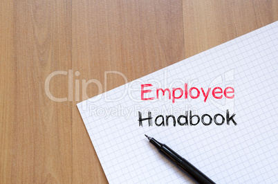 Employee handbook text concept on notebook