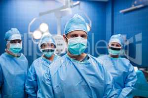 Portrait of surgeons standing in operation room