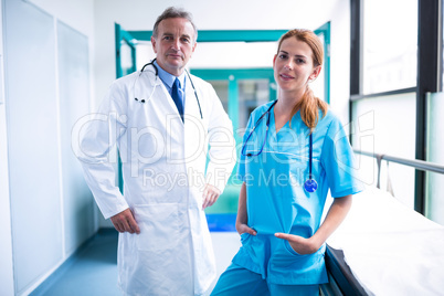 Portrait of doctor and surgeon standing in surgical room