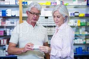 Customers checking medicines