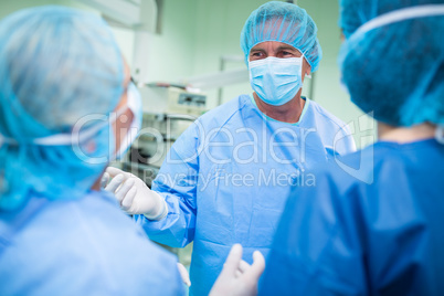 Surgeons interacting with each other in operation room