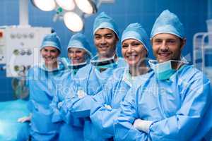 Portrait of surgeons standing in operation room