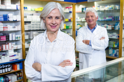 Pharmacists standing with arms crossed