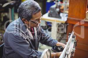 Shoemaker using sewing machine