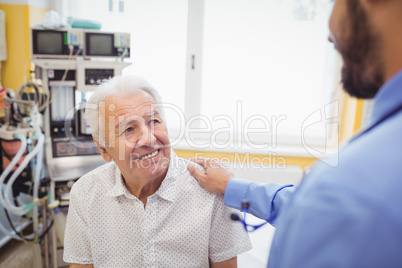 Doctor interacting with patient