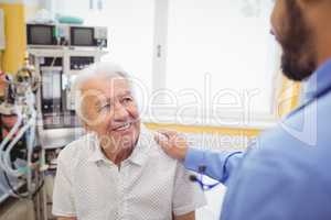 Doctor interacting with patient