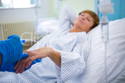 Nurse giving an injection to a patient