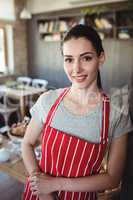 Portrait of female baker smiling